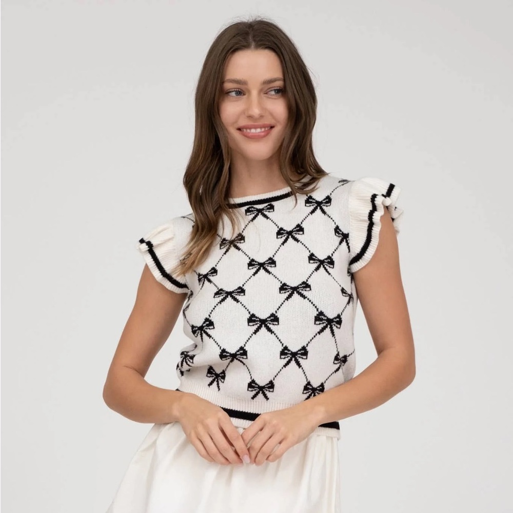 Elegant White and Black Bow Knit Top